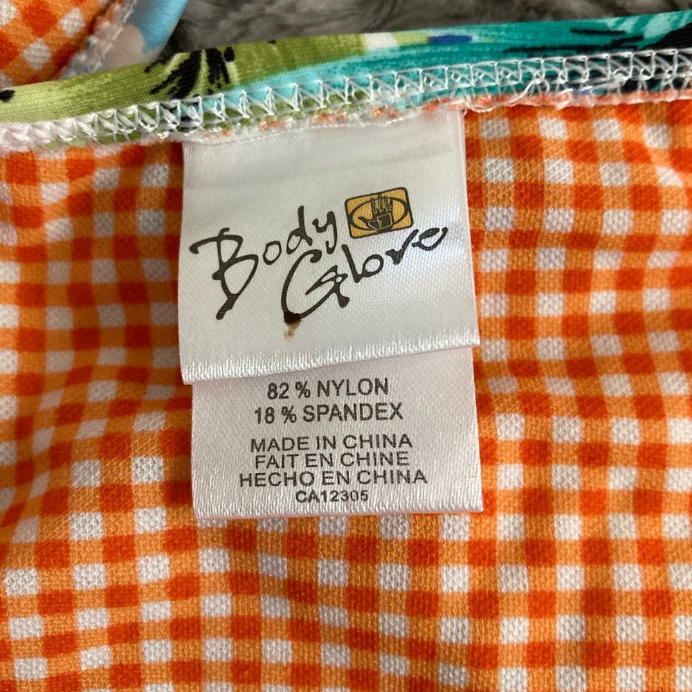 Women’s bikini, medium, made by body glove, practically new.
